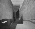 The designed ramp, made of rammed earth, leads to the shelter