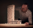 Boguslaw Barnaś with a model of Eco Warsaw Tower