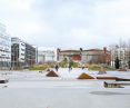 The public space in Västra Hamnen is designed to integrate residents; the town square has been combined with a square and skatepark; in the background you can see relics that testify to the industrial past of the place