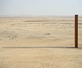 East-West/West-East installation (2014) rises from the sands of the Zekreet desert, Qatar