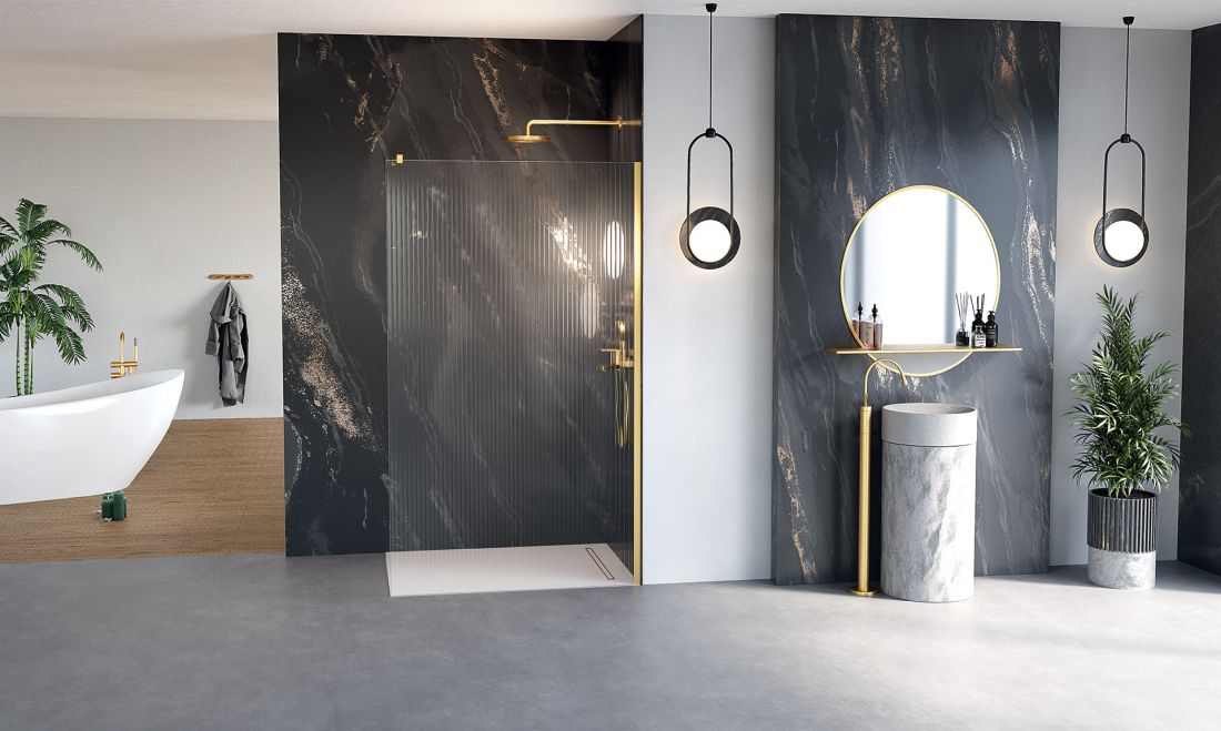 W ofercie New Trendy są wyjątkowe kabiny typu walk-in, w najmodniejszych kolorach. Na zdjęciu zaprezentowano kabinę Nesta w kolorze Gold Brushed, z popularnym ryflowanym szkłem Visiosun, dostępnym w ofercie Na Wymiar.