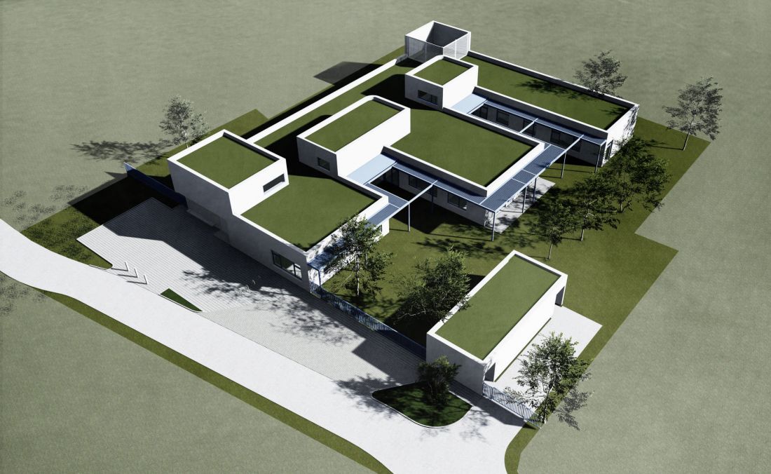 architekci zaprojektowali obiekt na planie zbliżonym do litery E z zielonymi patiami pomiędzy poszczególnymi blokami