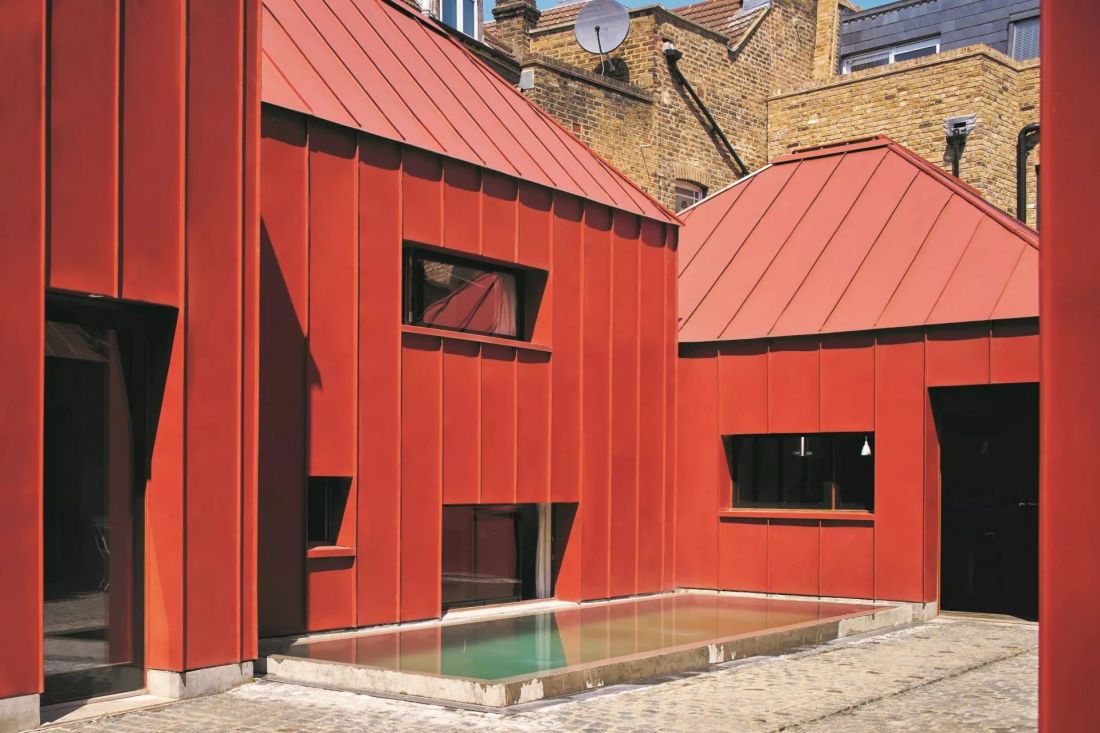 TIN HOUSE, LONDON Architect: Henning Stummel, Henning Stummel Architects Ltd. Product: GreenCoat PLX Pro BT Color: Brick Red RR7F2 / SS0742
