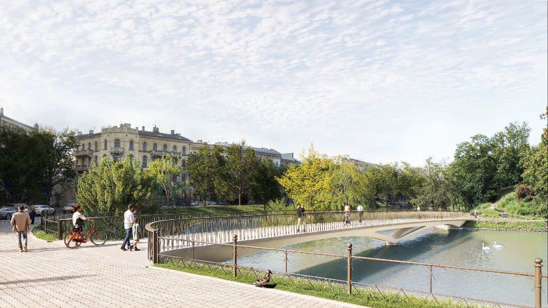 stalowe balustrady płynnie łączą się z miejskim ogrodzeniem