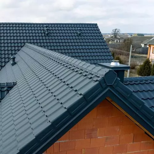 Modern steel roofs of the future. Timeless sheet metal roofing tiles and BUDMAT panels.