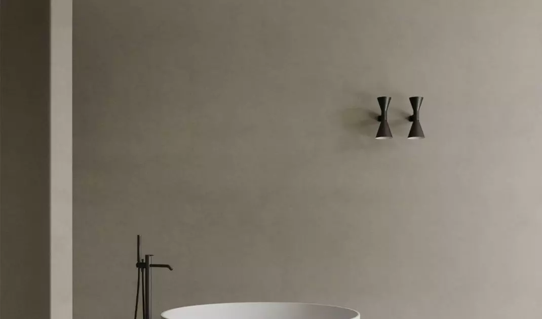 Round bathtub in a minimalist interior