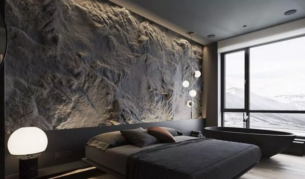 Wall imitating a rock arranged in a bedroom
