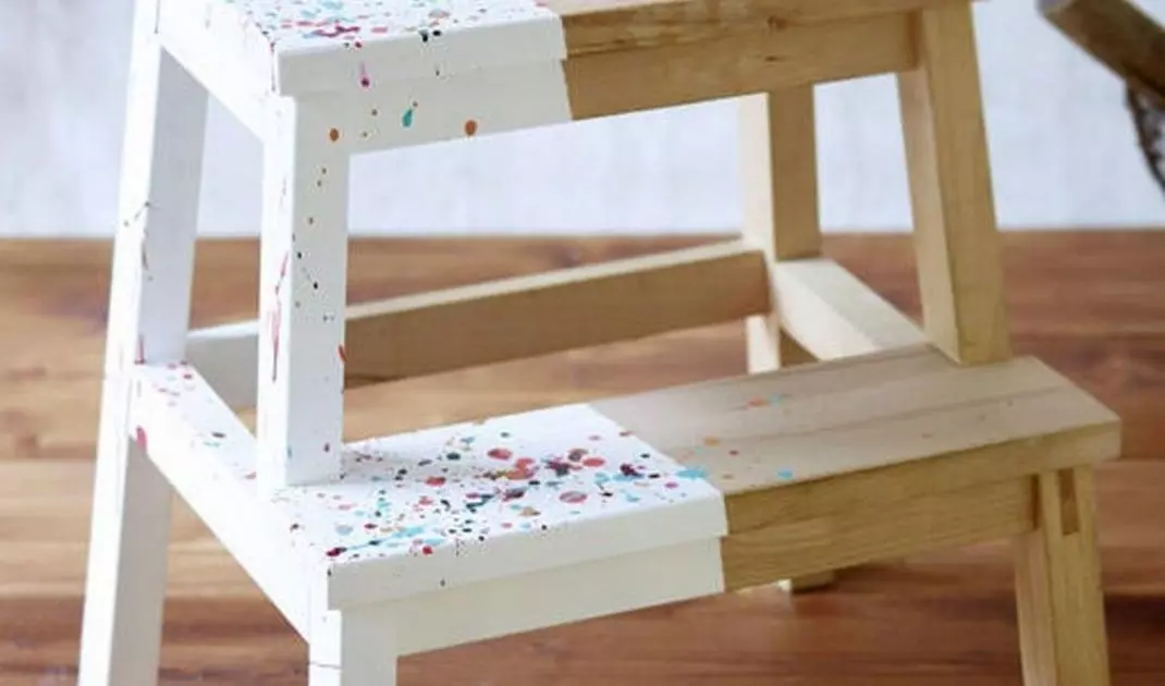 Stool painted asymmetrically