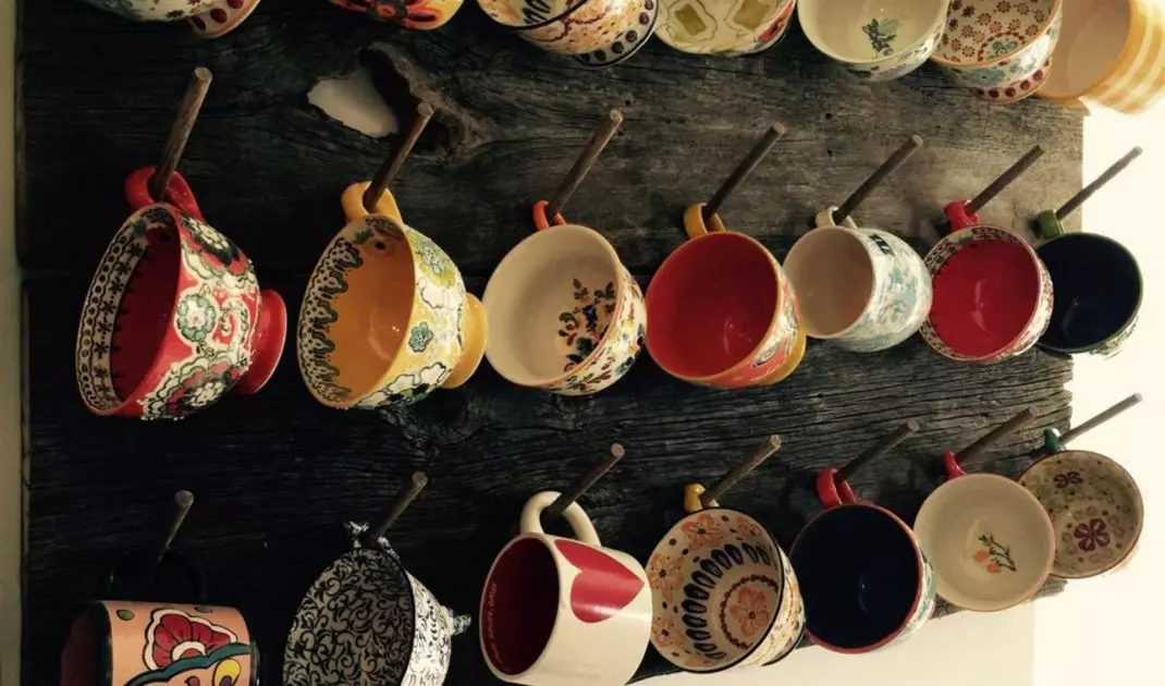 Collection of mugs on hangers