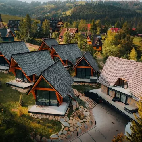 Villas like modern shepherd's huts. Settlement in Koscielisko designed by Karpiel Steindel Architecture.