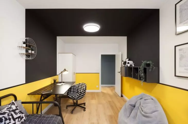 Interior in yellows, blacks and whites