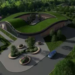Projekt hotelu dla zwierząt wyróżnia się falowanym, zielonym dachem