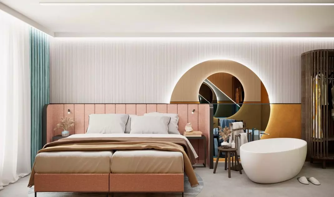 Suite with a bathtub in the bedroom