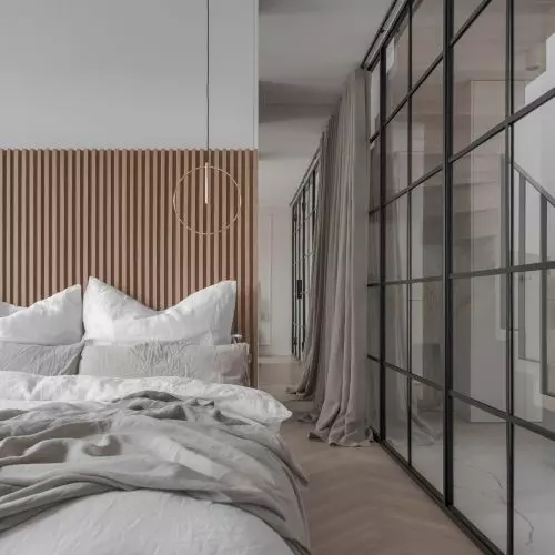 Subtle bedroom with a striking glass wall
