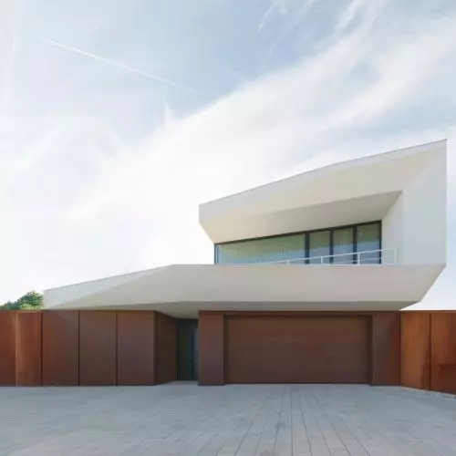 Dom inspirowany... kultową wuzetką! Projekt nowoczesnego domu jednorodzinnego autorstwa Superhelix