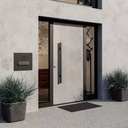 Aluminiowe drzwi ThermoSafe, wzór 860 z powierzchnią Decoral „jasny cement” z ramą w kolorze głębokiej czerni i uchwytem serii black.edition