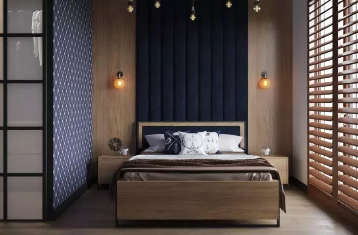 Bedroom and study in shades of black and warm wood