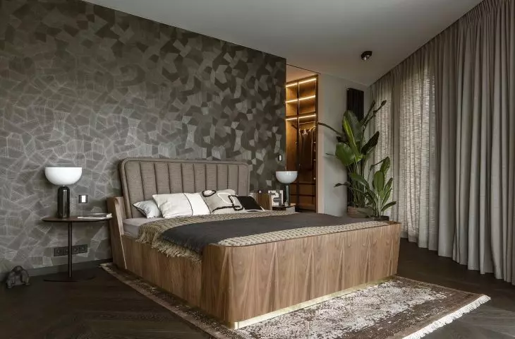 Elegant bedroom and dressing room decorated in earthy colors