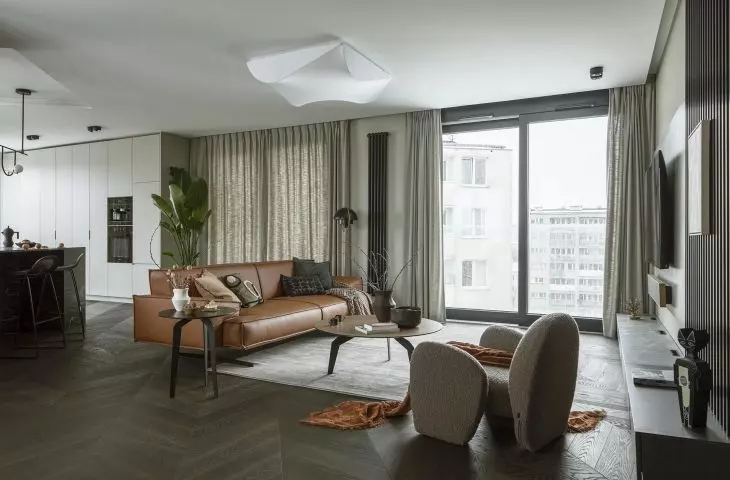Harmony of contrasts of living area with panoramic view of Warsaw