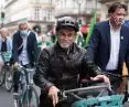 By bicycle in Paris, in the foreground Carlos Moreno