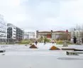 przestrzeń publiczna w Västra Hamnen ma za zadanie integrować mieszkańców; plac miejski został połączony ze skwerem i skateparkiem; w tle widoczne relikty świadczące o industrialnej przeszłości miejsca