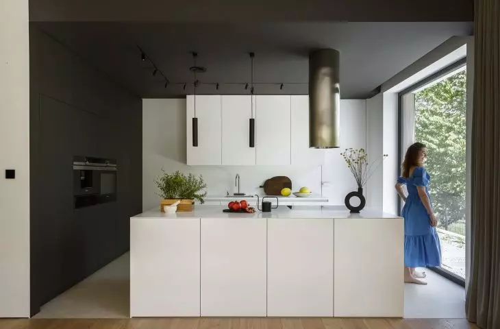 Classics with a modern twist. Arrangement of the kitchen with dining room