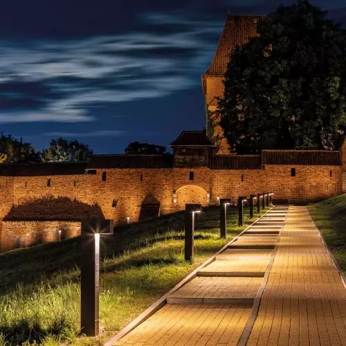 Illumination of the walls of Malbork Castle and the boulevard area on the Nogat River