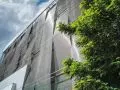 Elewacja z efektem 3D z napinanej siatki plecionej ze stali nierdzewnej, VIVE GROUP, projekt indywidualny PROGRESS ARCHITECTURE