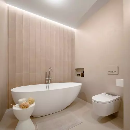 Two bathroom arrangements with microcement