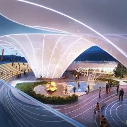 Futurystyczny pawilon ze świecącymi liniami, otoczony ludźmi i oświetlonymi miejscami do siedzenia.