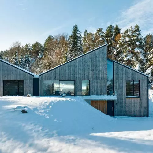 Three in one—a modern house in the Beskydy Mountains