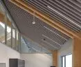 Sufit HeartFelt® Linear, Centrum handlowe Sterrenburg w Dordrecht, Niderlandy Fot. Hunter Douglas Architectural