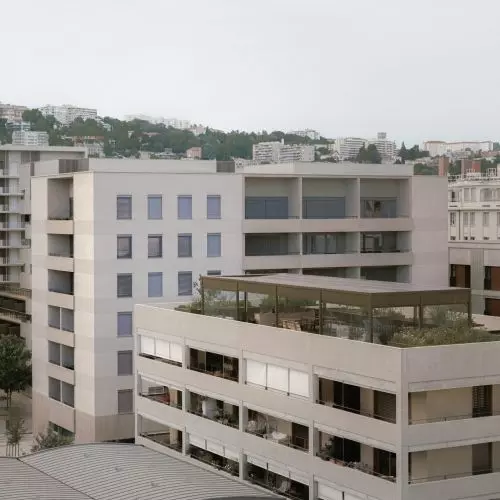David Chipperfield zaprojektował minimalistyczne mieszkania socjalne w Lyonie