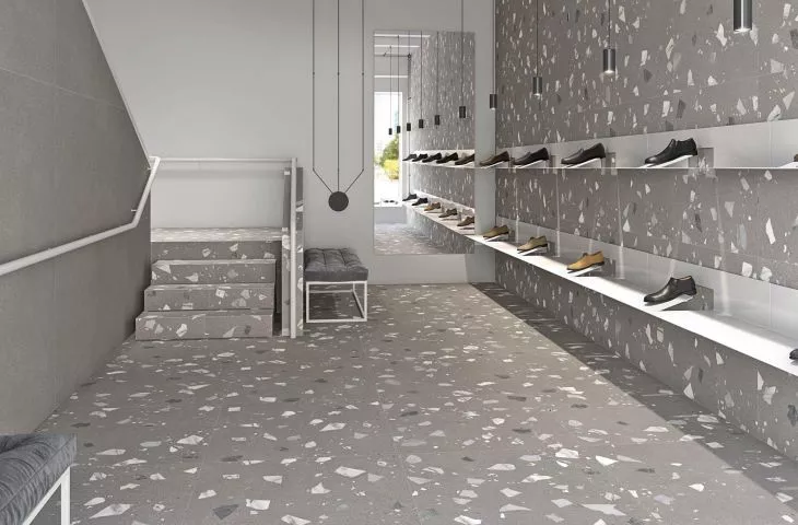 ELBURG and RIBE porcelain stoneware tiles. Imitation of natural stone and terrazzo effect