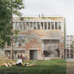 widok na zielone wnętrze urbanistyczne oraz na elewację frontową budynku zbiorów
