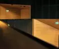 Emergency lighting that supports architecture and organizes space