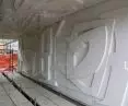 Trójwymiarowy relief na szkole Materna Taita Marcos wykonano w technologii ARbloc, umożliwiającej precyzyjne odwzorowanie złożonych form przestrzennych w betonie architektonicznym