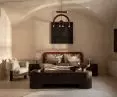 Calma, upholstered bed | Noko, armchair [ETERNO].