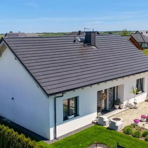 100 m² of happiness. Why small homes are such a big trend today—and what kind of roof goes best with them