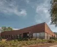 Raw brick on the outside, a colorful world on the inside. A new preschool and daycare center in Bieruń