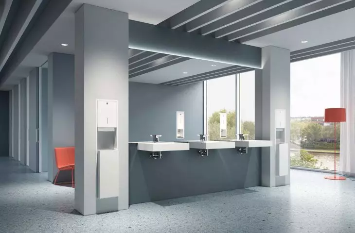 HEWI is expanding its System 900 to include concealed dispensers and waste management systems for public spaces
