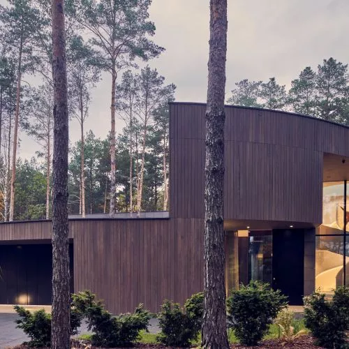 What does the forest hide? Circle Wood House from Mobius Architects with European Property Awards.