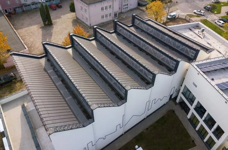 Shed roof and reference to the industrial character of the city - sports hall in Stalowa Wola