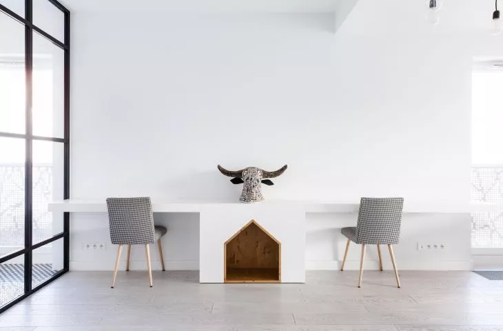 Timeless white and industrial accents. Apartment designed by Black Deer Workshop