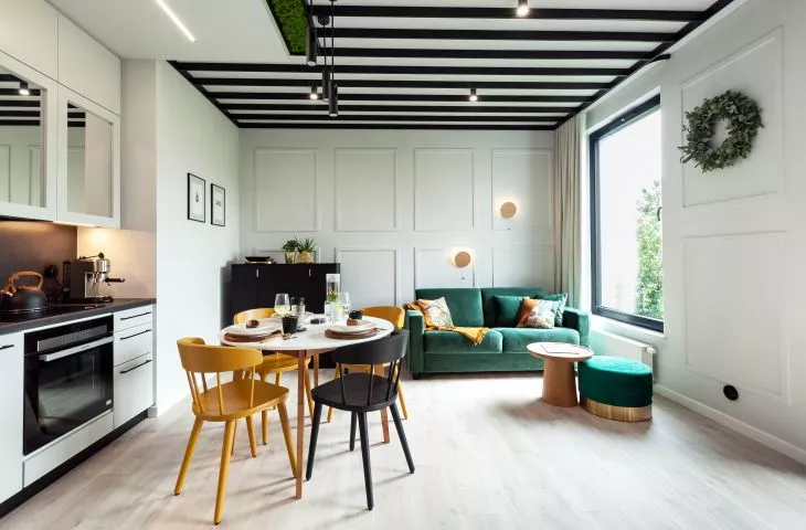 Apartment full of botanical motifs, Polish design and moss