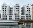Tytuł zdjęcia: Budynek Apartamentowy Granaria na Wyspie Spichrzów w Gdańsku: elewacja z ceramiki – terrakota architektoniczna