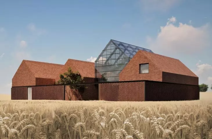 Farm House with an orangery. Brick single-family house in the midst of farmland