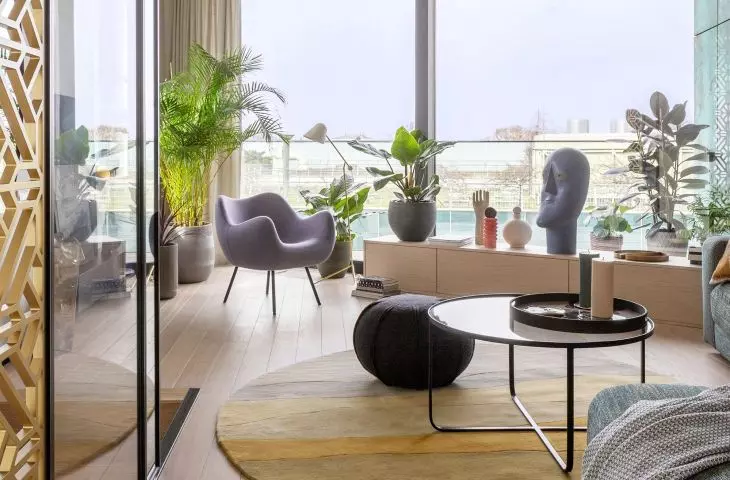 A two-level apartment full of art and color. Interior design by Modeko.Studio