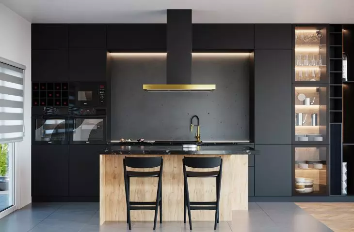 Kitchen with black appliances and gold-colored elements - the latest trends!
