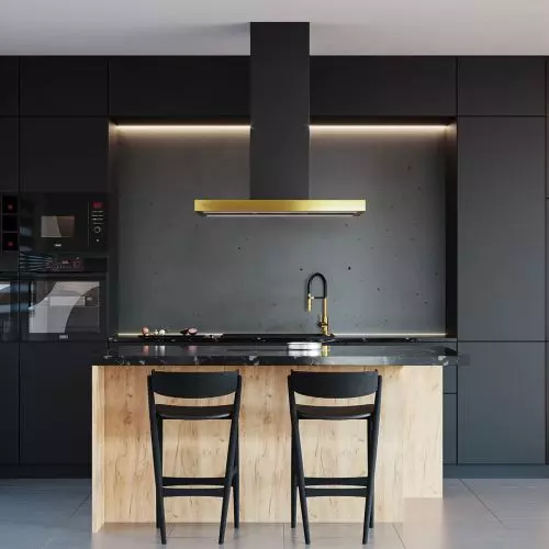 Kitchen with black appliances and gold-colored elements - the latest trends!
